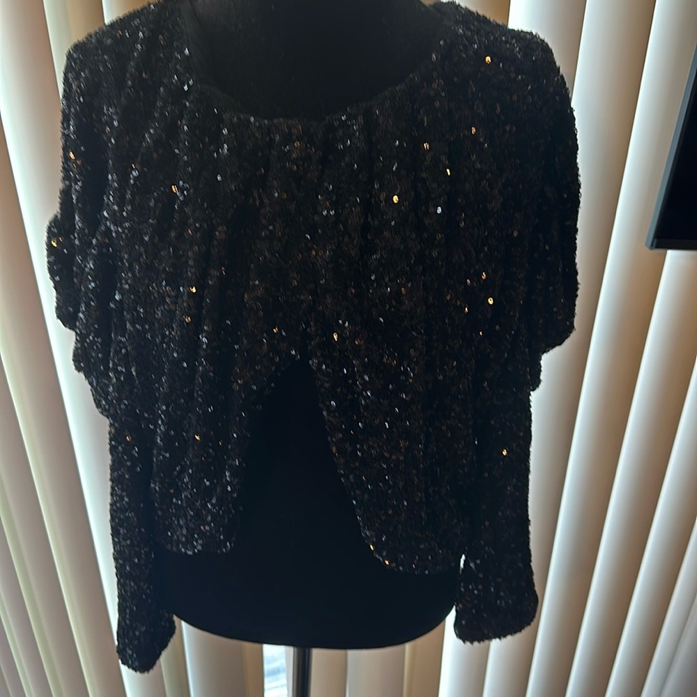 Great shrug for evening wear.  New, Never been used!!!